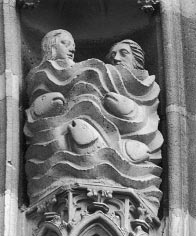 Figure 18. The Penitent Baptism of Adam and Eve. 1340–1351. West façade, detail of the upper tympanum, middle archivolt, Church of St. Théobald, Thann, France.